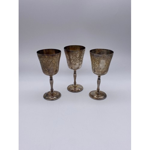 439 - THREE BIRMINGHAM SILVER ENGRAVED GOBLETS 13.2 OZ OVERALL APPROX