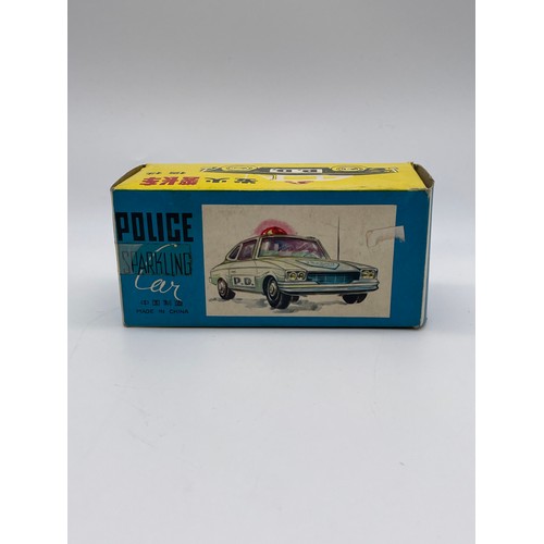 732 - BOXED CHINESE MF900 POLICE FRICTION CAR