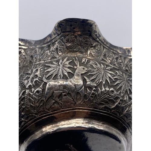 411 - WHITE METAL POSSIBLY INDIAN SHAPED REPOUSSE SHALLOW BOWL ENGRAVED WITH ELEPHANT TO THE BASE 2.5OZ AP... 