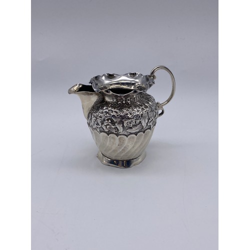 418 - BIRMINGHAM SILVER WRYTHEN AND REPOUSSE CREAM JUG 2.6 OZ APPROX