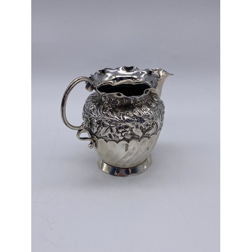 418 - BIRMINGHAM SILVER WRYTHEN AND REPOUSSE CREAM JUG 2.6 OZ APPROX