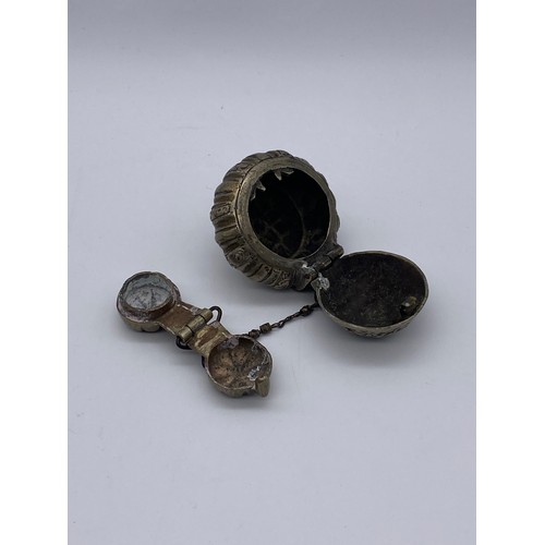 829 - MOROCCAN METALWARE POWDER FLASK, FAR EASTERN METALWARE BETEL BOX ON CHAIN AND A PILL BOX