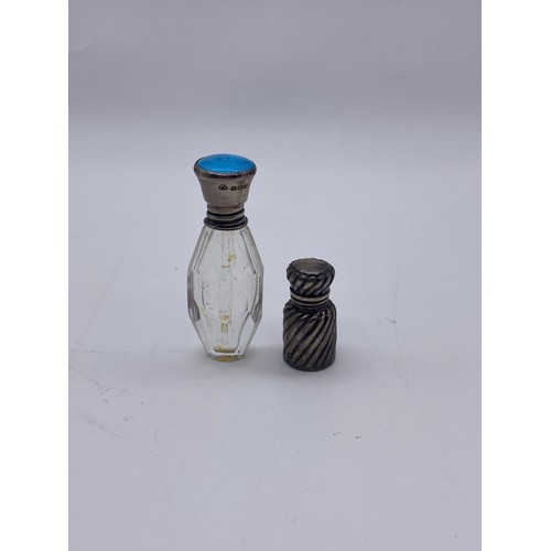 852 - SILVER WRYTHEN MINIATURE SCENT BOTTLE AND A SILVER TOPPED AND GUILOCHE ENAMEL SCENT BOTTLE