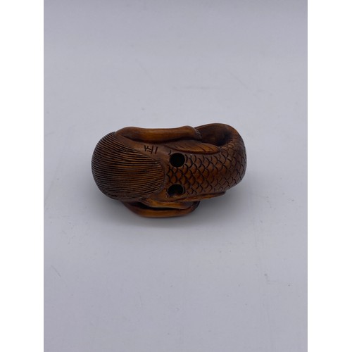 778 - JAPANESE BOX WOOD NETSUKE OF A MERMAID WITH CHILD