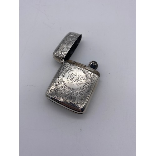 415 - CHESTER SILVER ENGRAVED VESTA CASE AND A SILVER ENGRAVED VESTA CASE CONVERTED TO LIGHTER 2.8OZ OVERA... 