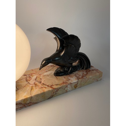 697 - ART DECO SPELTER BIRD IN FLIGHT TABLE LAMP WITH WHITE OPAQUE GLOBULAR SHADE