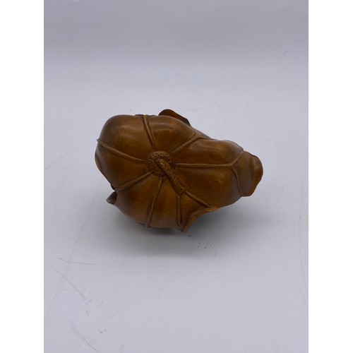 783 - JAPANESE CARVED OKIMONO OF A TOAD UPON A LOTUS LEAF