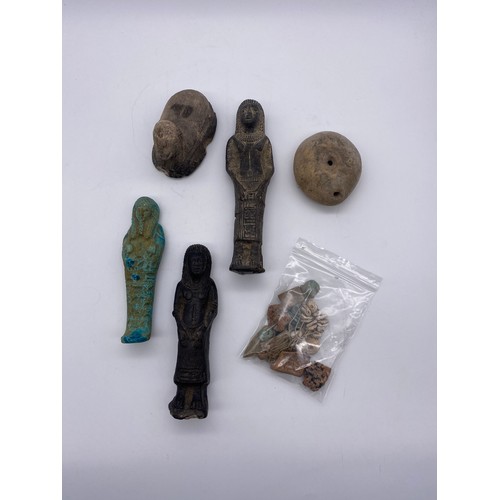 812 - EGYPTIAN PHOSPHORUS SHABTI, TWO OTHERS, STONE SPHINX MODEL AND A SELECTION OF FRAGMENTS