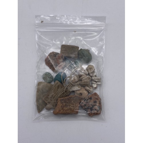 812 - EGYPTIAN PHOSPHORUS SHABTI, TWO OTHERS, STONE SPHINX MODEL AND A SELECTION OF FRAGMENTS