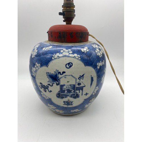 690 - CHINESE GLOBULAR BLUE AND WHITE PRUNUS VASE CONVERTED FOR ELECTRICITY