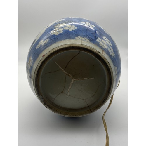 690 - CHINESE GLOBULAR BLUE AND WHITE PRUNUS VASE CONVERTED FOR ELECTRICITY