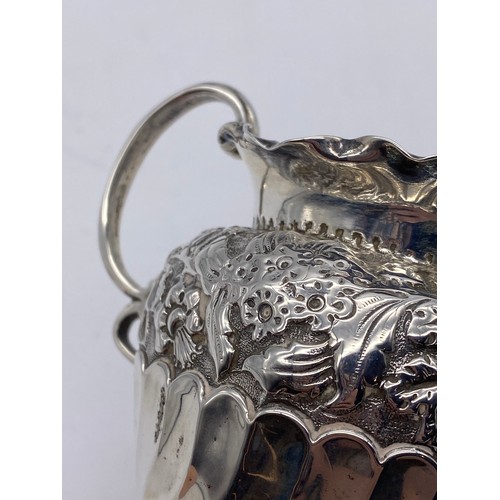 418 - BIRMINGHAM SILVER WRYTHEN AND REPOUSSE CREAM JUG 2.6 OZ APPROX