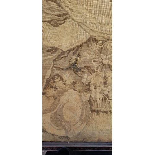 283 - TAPESTRY PANEL OF A COURTING COUPLE IN CARVED OAK FRAME