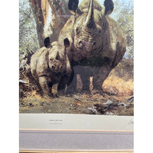 244 - DAVID SHEPHERD PRINT RHINO BEWARE 549/1300 SIGNED IN PENCIL WITH INVOICE FRAMED AND GLAZED