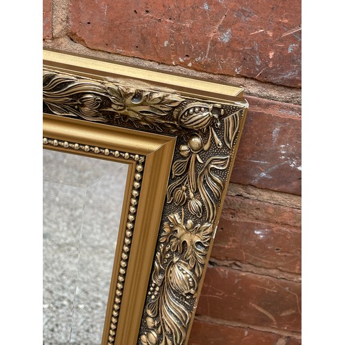 242 - LARGE ACANTHUS FRAMED BEVELLED MIRROR