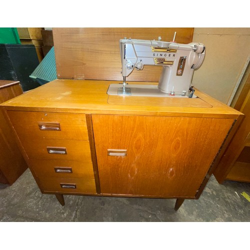 85 - TEAK CASED SEWING MACHINE CABINET AND CONTENTS