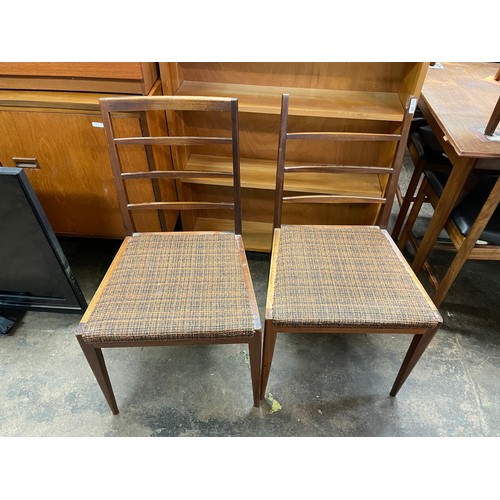 91 - MCCINTOSH TEAK EXTENDING DINING TABLE AND FOUR CHAIRS (TWO CHAIRS BAR BACK AS FOUND)