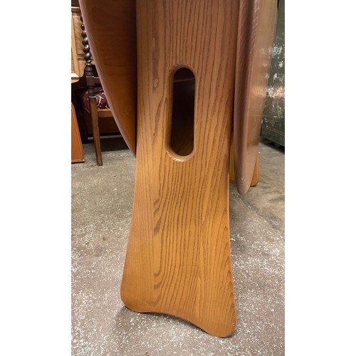 123 - ERCOL LIGHT ELM DROP FLAP GATELEG TABLE