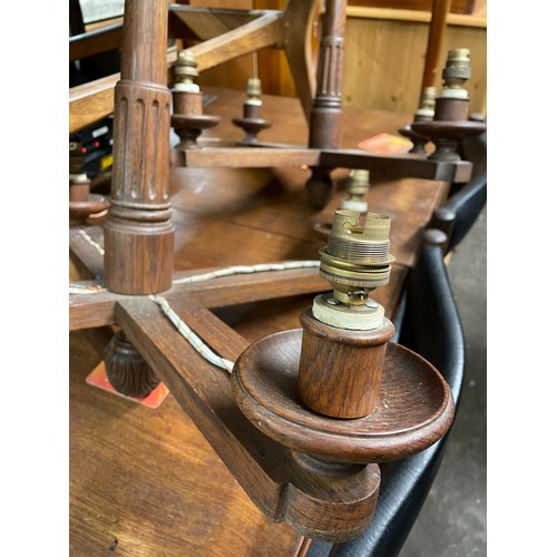 95 - PAIR OF OAK CRUCIFORM FOUR BRANCH ELECTRIFIED CEILING LIGHTS