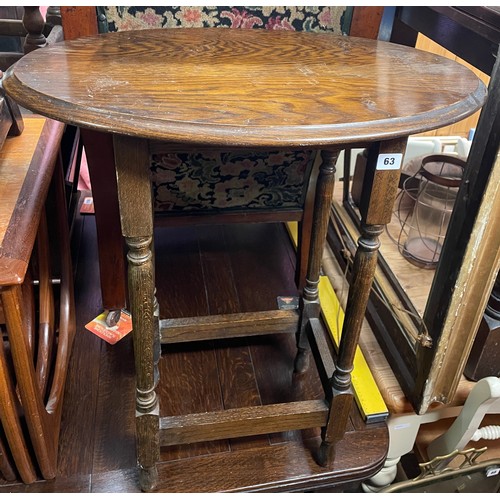 63 - OAK OVAL TOPPED OCCASIONAL TABLE