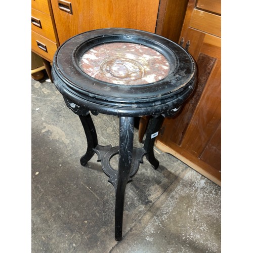 64 - CARVED EBONISED MARBLE INSET JARDINIERE STAND