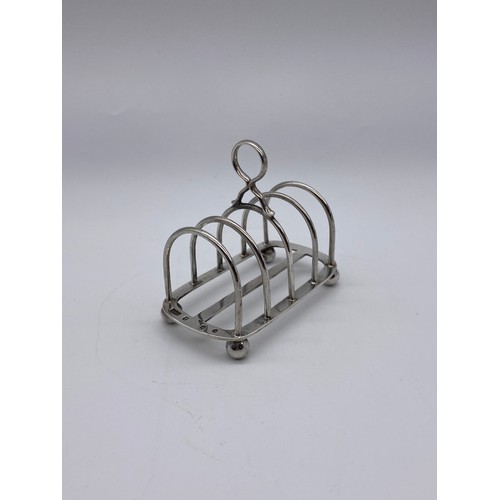 464 - EDINBURGH SILVER FOUR DIVISION TOAST RACK ON BUN FEET 3OZ