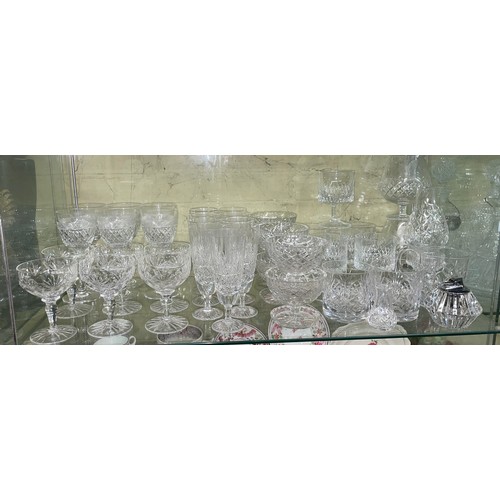 483 - SHELF OF GOOD QUALITY CUT GLASSWARE INC TALL WINES, CHAMPAGNE BOWLS, SQUARE SECTION DECANTERS AND TA... 