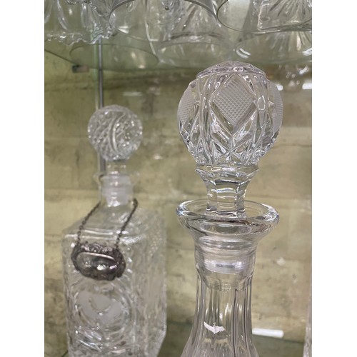 486 - SHIPS DECANTER AND STOPPER AND PAIR OF SQUARE SECTION DECANTERS WITH PLATED SPIRIT LABELS