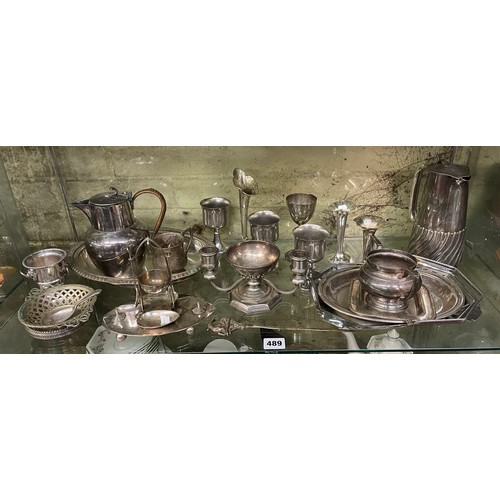 489 - SHELF OF PLATED METALWARES INC HOTWATER JUGS, SUCRIER, EGG CRUET