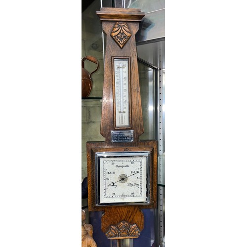 496 - CARVED OAK ANEROID BAROMETER