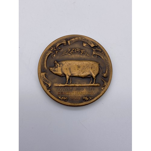 397 - FOUR NATIONAL PIG BREEDERS ASSOCIATION SHOW MEDALLION 1927, 1929, 1933