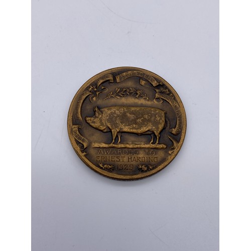 397 - FOUR NATIONAL PIG BREEDERS ASSOCIATION SHOW MEDALLION 1927, 1929, 1933