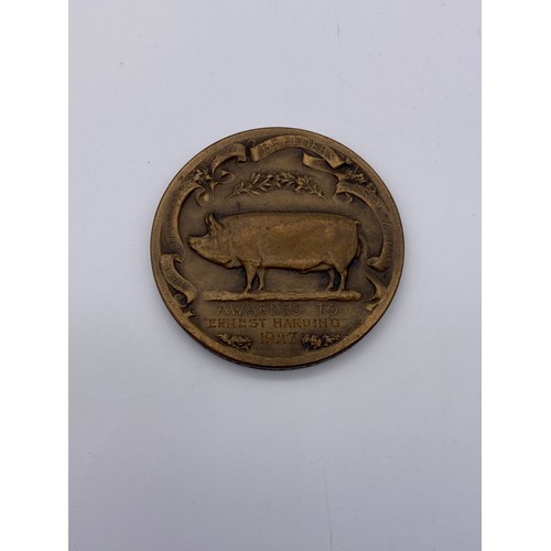 397 - FOUR NATIONAL PIG BREEDERS ASSOCIATION SHOW MEDALLION 1927, 1929, 1933