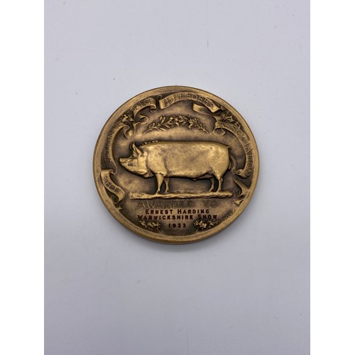 397 - FOUR NATIONAL PIG BREEDERS ASSOCIATION SHOW MEDALLION 1927, 1929, 1933