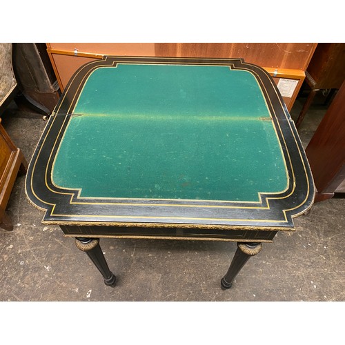 174 - NAPOLEAN III EBONISED CUT BRASS INLAID FOLD OVER CARD TABLE WITH GILT METAL MOUNTS, 86CM W X 75CM H ... 