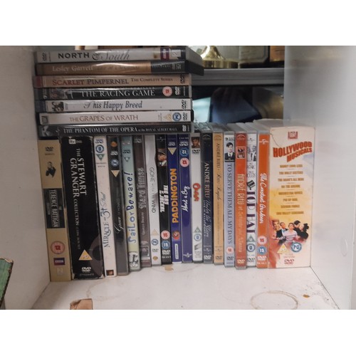 280 - THREE PIGEON HOLES OF DVDS AND BOX SETS FILMS AND DRAMA SERIES