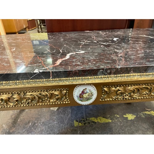 113 - SIMULATED MARBLE TOPPED AND GILT COFFEE TABLE WITH APPLIED PLAQUES