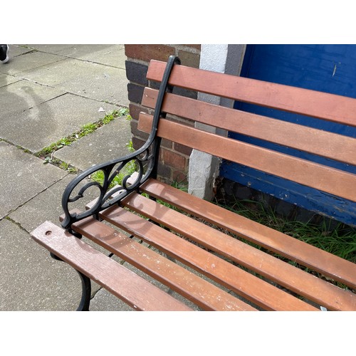 210 - WROUGHT IRON AND SLATTED GARDEN BENCH