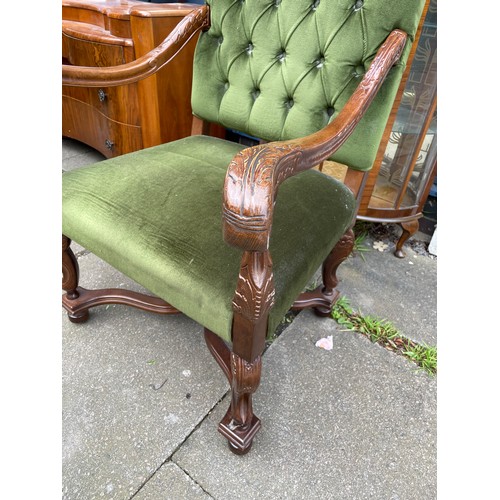 153 - REPRODUCTION CARVED CHARLES II STYLE UPHOLSTERED ELBOW CHAIR