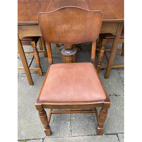 165 - OAK PLY DROP FLAP DINING TABLE WITH FOUR CHAIRS