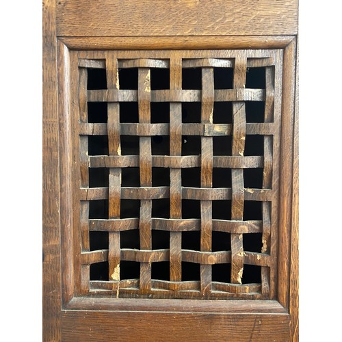 257 - CONTINENTAL PANELLED THREE DOOR KITCHEN CABINET WITH LATTICE SIDE PANELS