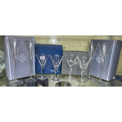 311 - TWO BOX SETS OF WATERFORD PANELLED GOBLETS AND TWO HEALS WINE FLUTES