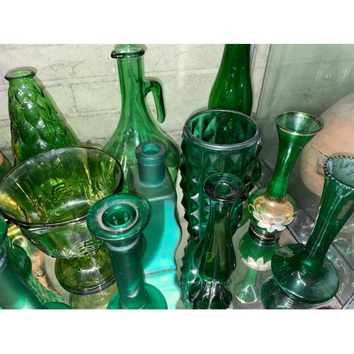 436 - SHELF OF PRESSED GREEN GLASSWARE VASES, BOTTLES, CANDLE HOLDERS