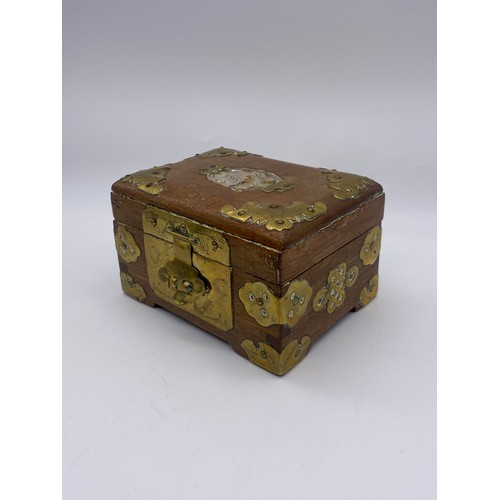 679 - CHINESE BRASS MOUNTED AND CARVED JEWELLERY CASKET