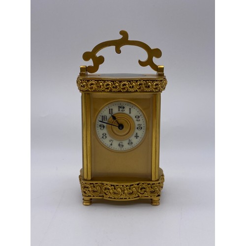 680 - QUALITY GILT ORMOLOU CHASED CASED CARRIAGE CLOCK WITH KEY