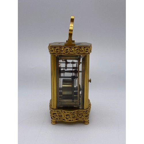 680 - QUALITY GILT ORMOLOU CHASED CASED CARRIAGE CLOCK WITH KEY