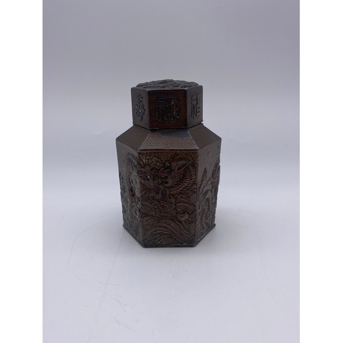 715 - JAPANESE HEXAGONAL COPPER PANELLED TEA CADDY DECORATED WITH CHASING DRAGONS