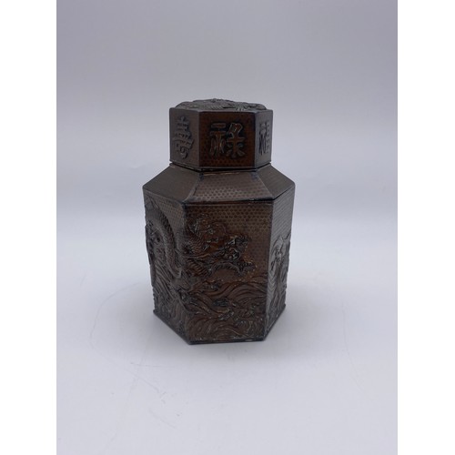 715 - JAPANESE HEXAGONAL COPPER PANELLED TEA CADDY DECORATED WITH CHASING DRAGONS