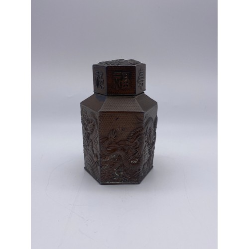 715 - JAPANESE HEXAGONAL COPPER PANELLED TEA CADDY DECORATED WITH CHASING DRAGONS