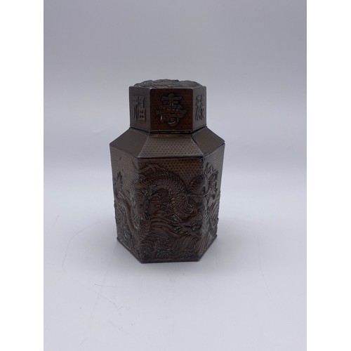 715 - JAPANESE HEXAGONAL COPPER PANELLED TEA CADDY DECORATED WITH CHASING DRAGONS